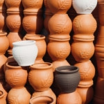 Clay & Consequence What your cookware is quietly adding to your bloodstream — and what a lump of fired earth can do about it