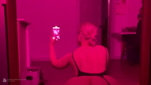 Blonde Mirror Tease In Pink Light