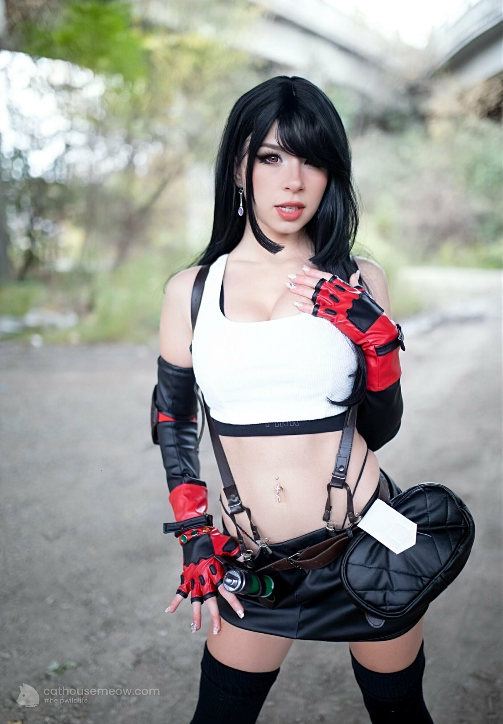 Dessie Cat as a black-haired street fighter