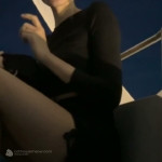 Smiling Blonde In Black After Dark
